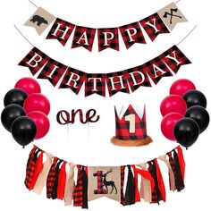 a happy birthday banner with balloons and streamers in the shape of a castle, one year old