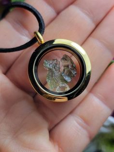 "Made to Order ~ GOLD Moldavite & Herkimer Diamond Locket Pendant : I absolutely love working with moldavite! It is my original love, as it was the first stone I could ever feel the energy pulsing out of. My face got flush, my hands sweaty, and my heart started beating quicker...I later learned this \"moldavite flush\" is the cause of your heart chakra being opened. Moldavite is known as a rapidly tranformational stone and I do believe it's an important one for us to share the love and knowl Amber Amulet Round Jewelry, Amber Round Amulet Jewelry, Amber Pendant Locket Jewelry, Nickel-free Gold Crystal Necklace Gift, Nickel-free Gold Crystal Necklace As Gift, Nickel Free Gold Crystal Necklace Gift, Keepsake Jewelry Round Pendant With Natural Inclusions, Gold Nickel-free Crystal Necklace Gift, Gold Nickel-free Crystal Necklace For Gifts