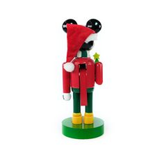 a toy figurine with a santa hat on