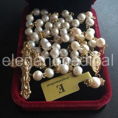 Elegant Pearl Rosary With Round Beads, Elegant Pearl Rosary With Cross, Elegant Yellow Gold Rosary With Crucifix, Gold Pearl Crucifix Jewelry, Gold Crucifix Necklace With 8mm Beads, Pearl Crucifix Necklace For Gift, Crucifix Pearl Necklace Gift, Elegant Gold Rosary For Gift, Elegant Pearl Rosary With 8mm Beads