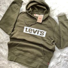 New With Tags Levi’s Army Green Logo Hoodie Sz Small Mens. Logo In White . Fits A Women’s Medium Or A Small For Oversized Look #Levis Green Relaxed Fit Casual Hoodie, Casual Green Everyday Hoodie, Levi's Cotton Sweatshirt For Winter, Casual Green Hoodie With Logo Print, Green Levis, Cheap Green Men's Hoodie, Levis Hoodie, White Fits, Levis Shirt