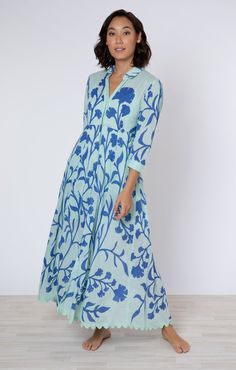 This Aqua / Blue Maxi Dress is the perfect addition to your summer wardrobe. Made from lightweight cotton, it features a long sleeve design and a vibrant Majorelle print. The shirt dress style is effortlessly chic, and the contrasting colors add a pop of fun. Plus, a slip is included for convenience. Experience a comfortable and stylish look with this maxi dress. Juliet Dunn is a luxury resort and beachwear brand that combines sun-drenched colours and artisan traditional techniques to create bea Beachwear Brands, Long Sleeve Design, Blue Maxi Dress, Cotton Slip, Maxi Shirts, Daytime Dresses, Maxi Shirt Dress, Blue Maxi, Shirt Dress Style