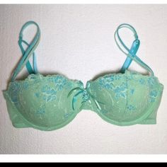 Size 34c Nwot Xhilarition Bra. Light Green And Blue Laced Demi Pushup Bra, Lightly Padded With Sheer Back. Spring Green Bra With Lace Trim, Green Lace Trim Bra For Spring, Blue Lace Bra With Removable Pads, Blue Padded Bra For Spring, Spring Light Blue Bra With Padded Cups, Light Blue Underwire Bra For Spring, Blue Lace Trim Bra For Summer, Blue Lace Trim Bra For Spring, Spring Light Blue Underwire Bra