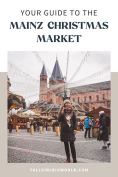 a woman standing in front of a christmas market with text overlay that reads your guide to the mainz christmas market