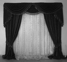 a black and white photo of a curtained window with lace on the edges, in an empty room