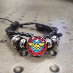 Wonder Woman Multi Layered Leather Bracelet. Nwot Adjustable 1.25" Across Face 4" Diameter When Fully Extended Retro Yellow Adjustable Bracelets, Multi Layering, Womens Jewelry Bracelets, Red Yellow, Dc Comics, Leather Bracelet, Wonder Woman, Women Jewelry, Wonder