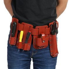 a man wearing a red leather belt with tools in his pocket and two yellow handles