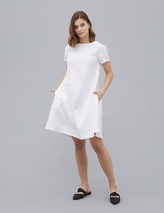 "This simple and cozy casual dress can be your companion everywhere - for elegant day parties, cozy, warm evenings or just to look stunning at work. This elegant dress is widening in bottom, what makes it look playful and cozy. Also this linen dress has pockets and made of 100% pure linen. Please check the size guide and pick up the right size according to the given measurements of the body. The size guide you will find with the pictures of this listing. If you are still unsure about sizing or h Casual Linen Plain Dress, White Midi Dress With Pockets, White Knee-length Midi Dress With Pockets, Chic Short Sleeve Plain Dresses, Casual White Dress With Side Pockets, White Casual Dress With Side Pockets, Casual White Dresses With Side Pockets, Everyday Summer Dresses With Slip Pockets, Plain Relaxed Fit Linen Dresses