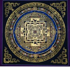 an intricate gold and blue design on a black background