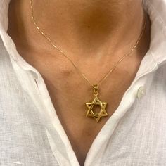 Star Of David Necklace made of Gold Vermeil: 18k Gold over Solid 925 Sterling Silver ☞ made to last. Matching Ring & Matching Earrings ☞ please ask me Details:• Dimensions: Pendant Height 32.5mm, Width 19.7mm• Free Complimentary Chain• 18k Gold Vermeil SKU TE-036 Spiritual Yellow Gold Star Jewelry, Star Of David Yellow Gold Plated Jewelry, Star Of David Yellow Gold Jewelry Gift, 14k Gold Star Of David Jewelry Gift, 14k Gold Star Of David Jewelry, Hallmarked 14k Gold Star Of David Jewelry, Star Of David Jewelry With Star Charm For Anniversary, Star Of David Charm Jewelry For Anniversary, Gold Star Of David Jewelry For Anniversary