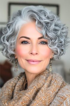 Cropped Curly Bob Hairstyle on a smiling woman in her 50s with gray hair. Short Curly Gray Hair Over 50 Curls, Short Length Curly Hair, Gray Curly Hair Natural Curls, Short Curly Gray Hair Over 50, Gray Curly Hair, Gray Haircut, Curly Silver Hair, Haircut Gray Hair