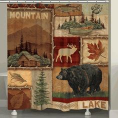 a shower curtain with an image of a bear, moose and mountains in the background