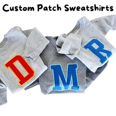 Fun Personalized Letter Patch Sweatshirt, perfect for a family matching outfit with a college-style pullover look. Choose your favorite letter in an array of colors, available in both pocket style on the left chest side of the pullover or center chest placement. For 2t to adult small options, we recommend the center chest placement, while the left chest placement works best for youth medium to adult 2xl options. HOW TO ORDER: Select your letter and size from the drop-down menu, then let us know: Cheap Family Sweatshirt With Letter Print, Patch Sweatshirt, Matching Sweatshirts, Matching Outfit, Personalized Letters, College Style, Custom Patches, Matching Family Outfits, Embroidery Patches