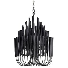 a black chandelier hanging from a chain with lots of sticks sticking out of it