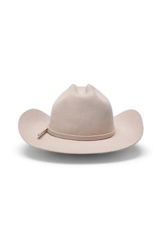 Introducing the light beige Breezy Vision cowboy hat—a timeless piece crafted in our classic silhouette, complete with a refined center crease and a flanged brim. This versatile hat features a tonal self-fabric band, accented by a sleek round silver stud that adds a touch of subtle sophistication. Each hat is handcrafted in our Stockholm studio, ensuring exceptional quality and a perfect fit for all. Western Solid Hat Bands For Rodeo, Classic Wide Brim Felt Hat For Rodeo, Western Fitted Hat Bands, Fitted Solid Color Hat Bands For Rodeo, Rigid Flat Brim Hat Bands For Rodeo, Classic Felt Hat For Western-themed Events, Classic Wide Brim Felt Hat For Ranch, Classic Felt Hat For Ranch, Fitted Felt Hat With Curved Brim For Rodeo