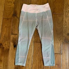 Excellent Condition! Possibly Nwot. No Signs Of Any Wear Or Flaws Colors: Light Pink, Gray And Hints Of White Has A Dotted Print Throughout The Leggings Except The Waist Waist Is Elastic Had A Mesh Material That At The End Of Leggings That Start From The Side To The Back Length: 29in Inseam: 19 1/2in Pink Stretch Capris For Workout, Fitted Pink Capris For Summer, Pink Stretch Capris For Spring, Pink Fitted Casual Capris, Pink Stretch Capri Bottoms, Stretch Pink Capris, Pink Stretch Capri-length Bottoms, Pink Spring Leggings For The Gym, Pink Gym Leggings For Spring