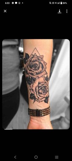 a woman's arm with roses on it and the words, i love you