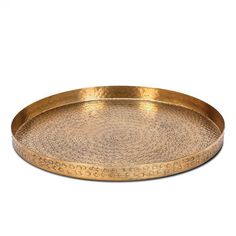 an oval brass tray on a white background