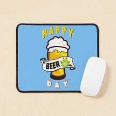 a happy beer day mouse pad next to a computer mouse