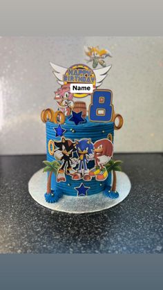 a birthday cake with sonic the hedgehog characters on it