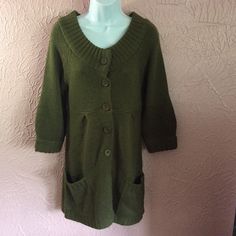 Beautiful Long Heavy Knit Sweater For Winter. From Red Paint. Size Medium. New With Tags. Green. Button Front Cardigan With Front Pockets. Bust: 34" Shoulders: 17" Sleeve Length: 19 1/2" Sweater Length: 28" Casual Fitted Sweater Coat With Buttons, Fitted Casual Sweater Coat With Buttons, Cozy Green Sweater With Buttons, Green Knit Outerwear With Buttons, Heavy Knit Sweater, Button Front Cardigan, Heavy Knit, Green Button, New Green