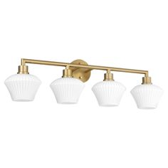 three light bathroom fixture in an antique brass finish with frosted white glass shade shades