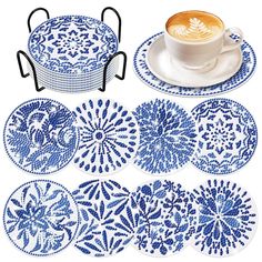 four blue and white plates with coffee cup on each plate, one in the middle