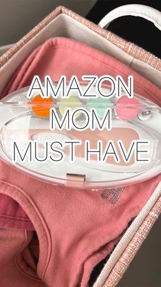 an open suitcase with the words amazon mom must have on it