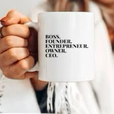 a woman holding a white coffee mug with the words boss, for no one, entreprenerr, owner, co