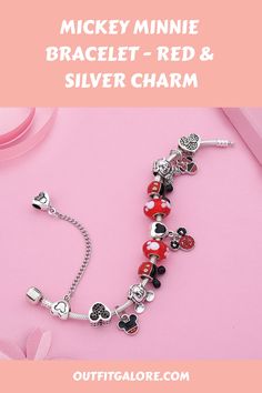 Our Red and Silver Charm Bracelet with a Mickey and Minnie Pendant Bead is the perfect addition for those who adore Disney or want to add a touch of fun to their jewelry collection. This classic design is sure to capture hearts with its charming pendant that showcases the beloved characters, Mickey and Minnie. Don this stunning piece on your wrist and let it bring joy to your day while also adding some whimsy to any outfit. Get ready for compliments galore with this must-have accessory! Themed Red Nickel-free Jewelry, Nickel-free Themed Red Jewelry, Nickel-free Red Themed Jewelry, Personalized Disney Silver Jewelry, Disney Silver Bracelet Gift, Disney Silver Bracelet For A Gift, Themed Mickey Mouse Jewelry As Gift, Silver Disney Bracelet For Gift, Disney Silver Jewelry For Valentine's Day