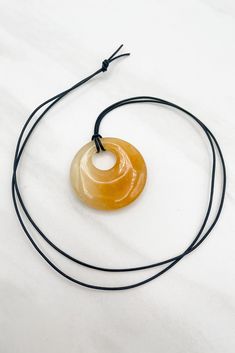 Sunny Genuine Stone Disk Leather Cord Necklace Adjustable Yellow Round Pendant Necklace, Adjustable Yellow Necklace With Round Pendant, Leather Cord Necklace, Yellow Jade, Leather Corded Necklace, Jade Stone, Cord Necklace, We Wear, Store Credit Cards