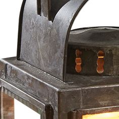 an old fashioned stove with the light on