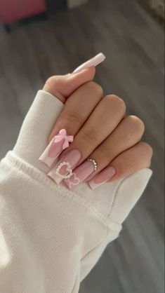 nails, pink nails, nail ideas, coquette nails, cute nails, coquette, cute, pretty, adorable Pink And White Nails With Charms, Pink And White Bow Nails, Bo Peep Nails, Simple Nail Ideas Pink, Poses To Show Off Nails, Bow Nail Designs, Trending Streetwear, Pastel Nail, Cute Simple Nails