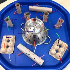 a blue tray filled with different types of objects