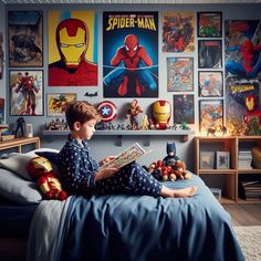 a young boy sitting on top of a bed reading a book in front of avengers posters