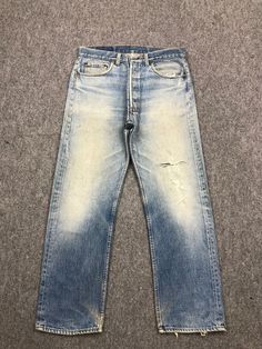 Condition: USED. refer picture and details Vintage Distressed 80s Levis 501 Faded Blue Light Wash Jeans Mid Waisted Denim Mom Jeans 501 512 505 550 517 Boyfriend Jeans waist : 32 inches outseam : 39 inches inseam : 28.5 inches  Kindly note that the item is used! Please ensure that the size and conditions meet your requirements before purchasing. Please contact me to get more photos and details. I will reply you ASAP. payment: PayPal Shipping Worldwide. Check out my other items! DP0519 Vintage Washed Blue Bottoms, Vintage Blue Washed Bottoms, Vintage Blue Pre-washed Jeans, Vintage Ripped Washed Blue Jeans, Vintage Ripped Medium Wash Bottoms, Vintage Washed Rigid Denim Bottoms, Vintage Ripped Straight Leg Bottoms, Classic Distressed Faded Bottoms, Classic Faded Distressed Bottoms