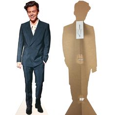 a cardboard cutout of a man in a suit and tie standing next to a cardboard mannequin