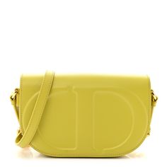 This is an authentic CHRISTIAN DIOR Calfskin CD Signature Flap Crossbody in Lime. This bag is finely crafted of smooth green calfskin leather. The bag features a chain and leather adjustable strap. The flap opens to a green suede interior with a zipper pocket. Small Lady, Green Suede, Lady Dior, Flap Bag, Dior Bag, Eden, Christian Dior, Calf Skin, Zipper Pocket