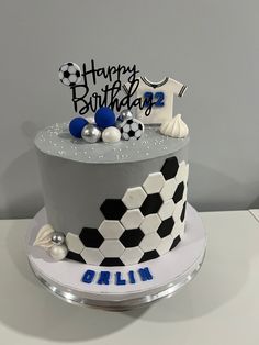 a soccer themed birthday cake on a table