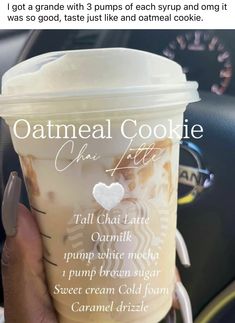 someone holding up a coffee cup with the words oatmeal cookie on it