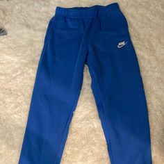 Never Worn, Bright Blue Nike Sweatpants Nike Joggers Blue, Blue Athleisure Sweatpants For Spring, Spring Blue Athleisure Sweatpants, Blue Sporty Sweatpants For Spring, Sporty Blue Cotton Pants, Blue Athleisure Pants For Loungewear, Blue Tapered Leg Sweatpants For Loungewear, Casual Blue Nike Joggers, Blue Athleisure Joggers With Elastic Waistband