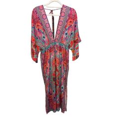 Umgee Pink Paisley Beach Pool Coverup Dress Maxi In A Size Medium Length 50" Bust 42" Waist 30" Hip 52" Gorgeous Pink Paisley Print Low V Neck And Back With Tie Neck Back With Tassel Detail Elasticized Empire Waist Kimono Style Sleeves Side Slits 100% Poly Preowned In Excellent Condition. Looks Barely Or Never Worn. Smoke Free Pet Free Home Perfect Vacation Piece Pool Coverup Beach Coverup Boardwalk Tropical Cruise Vacation Travel B14 Pink V-neck Sundress For Beach, Pink V-neck Sundress, Beach Dresses With Vibrant Print, Pink V-neck Sundress For The Beach, Pink V-neck Maxi Dress With Vibrant Print, Pink V-neck Dresses For Vacation, Colorful Spring Beach Maxi Dress, Pink Maxi Dress With Vibrant Print For Beach, Bohemian Multicolor Print Maxi Dress For Day Out