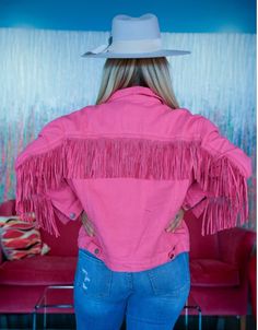 Fun pink denim jacket features 2 chest pockets with rhinestone fringe, 2 side pockets and rhinestone fringe across back and down both arms. Fringe approx 5" long 90 cotton/ 10 polyester. Jacket does not have stretch, but is running true to size. Small 4-6 Medium 8-10 Large 12-14 XL 16-18 2X 18-20 3X 20-22 Cheap Pink Long Sleeve Denim Jacket, Space Cowgirl Coats & Jackets, Pink Fringe Jacket, Denim Jacket With Fringe, Hot Pink Denim, Classy Cowgirl, Pink Denim Jacket, Rhinestone Fringe, Pink Denim