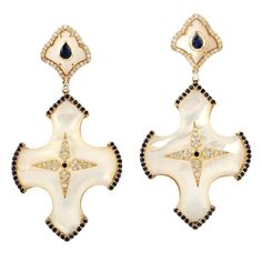 Hand cast from 18-karat gold, these stunning earrings are set with 1.2 carats blue sapphire, 31.34 carats pearl and .66 carats of glimmering diamonds. FOLLOW MEGHNA JEWELS storefront to view the latest collection & exclusive pieces. Meghna Jewels is proudly rated as a Top Seller on 1stDibs with 5 star customer reviews. All items manufactured by us are handmade and can be customized or redesigned. Composition Size-53x27 MM Total Weight-18.33 Gold Weight(Gms)-11.731 Diamond Wt(Cts)-0.66 Pearl Wt(C Luxury Sapphire Diamond Earrings, Luxury Sapphire Earrings, Luxury Pearl Earrings With Diamond Accents, Luxury White Diamond Pierced Earrings, Luxury Blue Pearl Drop Earrings, Pearl Diamond Dangle Earrings, Art Deco Drop Earrings, Sapphire And Diamond Earrings, Freshwater Pearl Jewelry