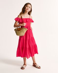 Flattering maxi dress in a soft cotton fabric, featuring off-the-shoulder detail, adjustable straps and a tiered skirt. Flattering Maxi Dress, Active Swimwear, Girls Maxi Dresses, Boys Romper, Girl Online, Boys Boots, Abercrombie Kids, Dress Girls, Tiered Skirt