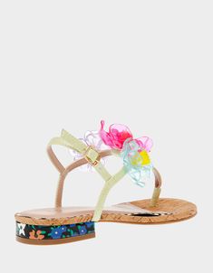 Unleash your playful side with our HAVANAH thong sandal! This flat t-strap style boasts translucent flower appliques, adding a touch of quirkiness to any outfit. Synthetic upper material Synthetic lining/sock Synthetic sole 1 inch heel height Imported Flower Applique, Thong Sandals, T Strap, Women's Sandals, Flat Sandals, Appliques, 1 Inch, Womens Sandals, Heel Height