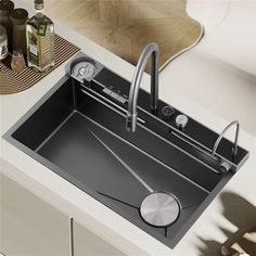 a kitchen sink sitting on top of a counter