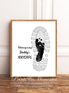 a black and white drawing of a foot print with the words, following in my daddy's hooties