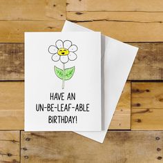 a card with a flower on it that says have an un - be - leaf - able birthday