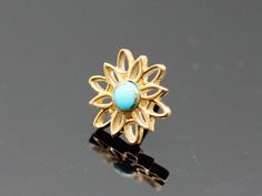 Pin with Marisol- 7mm- Negative space flower with 2mm bezel center 2mm Turquoise round (1) 27g Push Pin Flat Tops made from solid 14k Solid gold  (NOT plated or filled) compatible with neometal push pin bases Gold Threadless Ends. "Press-fit" gem ends. The threadless or "press-fit" system is an effective alternative to internally-threaded body jewelry and is currently in wide use by many body piercers. WHAT'S THE DIFFERENCE IN GOLD COLORS? The three different gold colors are the perfect array. T Negative Space Flower, 18g Nose Ring, Medusa Piercing, Septum Jewelry, Gold Colors, Nose Rings, Nose Ring Stud, Vintage Candles, Classic Gold